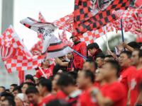 开云体育中国-热衷于比赛的球迷为自己心仪的球队助威呐喊